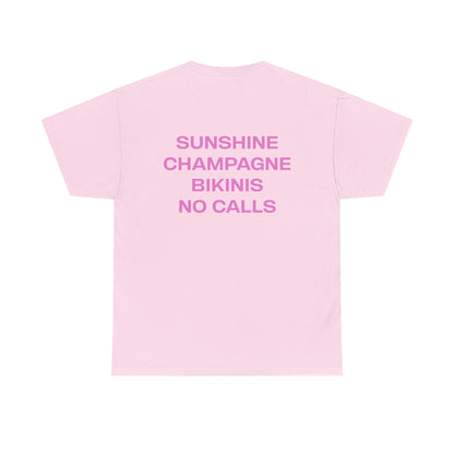 Pink t-shirt with text 'Sunshine Champagne Bikinis No Calls' on a white background