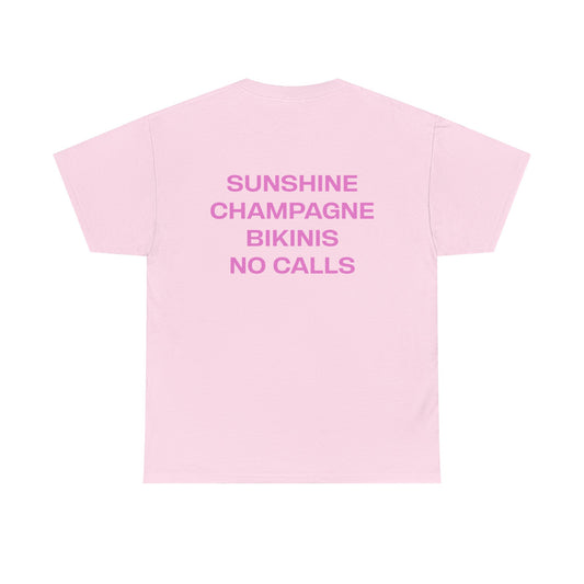 Pink t-shirt with text 'Sunshine Champagne Bikinis No Calls' on a white background
