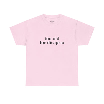 Pink t-shirt with 'too old for dicaprio' text on a white background