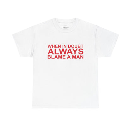 White t-shirt with red text 'WHEN IN DOUBT ALWAYS BLAME A MAN' on a white background