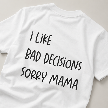 White t-shirt with black text 'I Like Bad Decisions Sorry Mama' on a light gray background